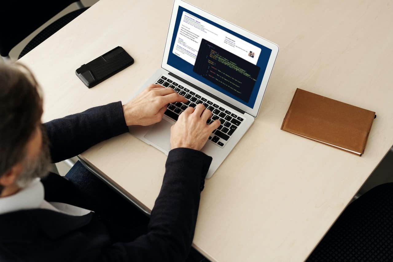 A developer is using Zenserp Search Google API on his laptop